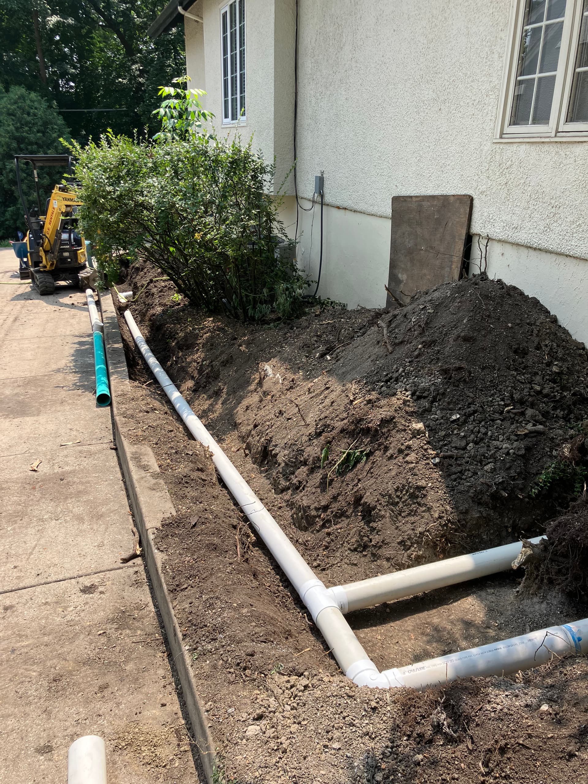 Downspout and sump pump line